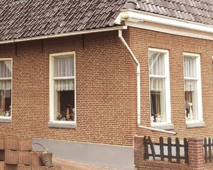 Restauratie gevel en reinigen woonboerderij